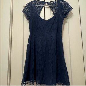 Navy blue lace dress with sweetheart neckline and short sleeves